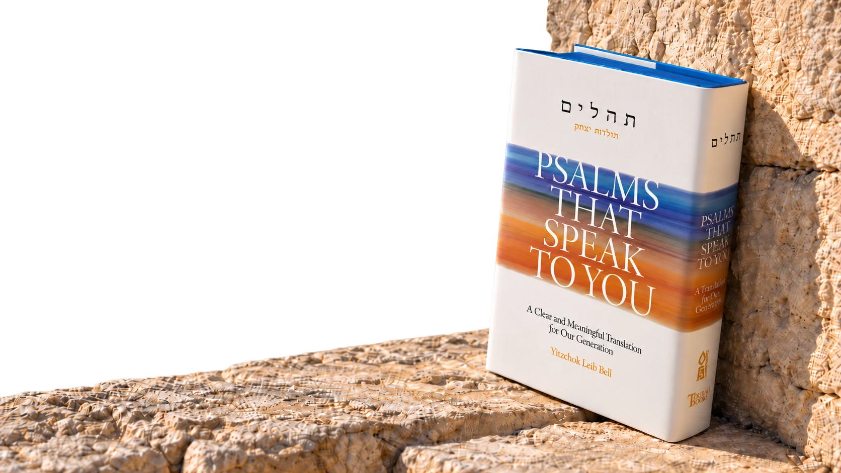 Psalms That Speak to You hardback resting on a stone wall above the Old City of Jerusalem